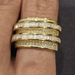 Cubic Zirconia set in 14k gold plated sterling silver, highway crossover ring. 7